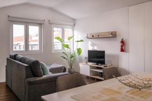 Et tv og/eller underholdning på Snuggly Corner by Trip2Portugal