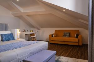 En eller flere senge i et værelse på Snuggly Corner by Trip2Portugal