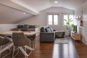 Et opholdsområde på Snuggly Corner by Trip2Portugal