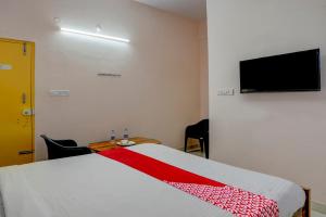 TV a/nebo společenská místnost v ubytování Hotel O VBH Inn