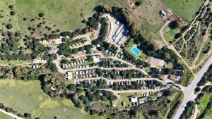 an aerial view of a park with trees and houses at TAIGA Tarifa Valdevaqueros in Tarifa +42 photos