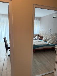 Posteľ alebo postele v izbe v ubytovaní Mosoly Szallashely
