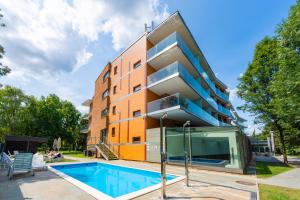 Bazén v ubytování Abacus Business & Wellness Hotel nebo v jeho okolí