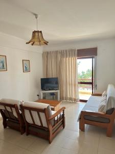 Μια τηλεόραση ή/και κέντρο ψυχαγωγίας στο Apartamentos Carteia