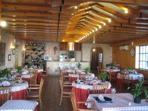 Reštaurácia alebo iné gastronomické zariadenie v ubytovaní Hotel Verona