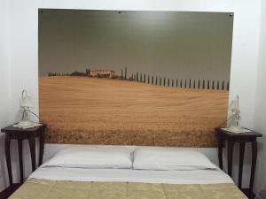Postel nebo postele na pokoji v ubytování B&B Il Casale di Nanni