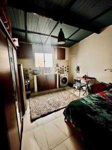 Ένα ή περισσότερα κρεβάτια σε δωμάτιο στο Kleines Haus Rooftop Studio