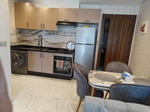 Dapur atau dapur kecil di Apartamento mehdia Kenitra