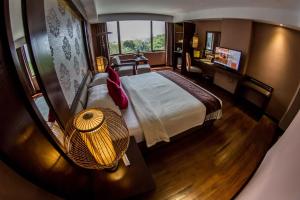Katil atau katil-katil dalam bilik di Rose Garden Hotel