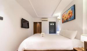 Postel nebo postele na pokoji v ubytování Thuan Phat Hostel