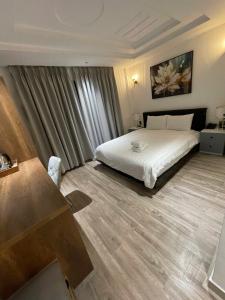 Postel nebo postele na pokoji v ubytování Thuan Phat Hostel