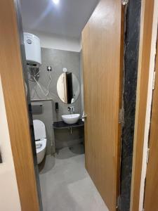 Koupelna v ubytování Hotel Srijan