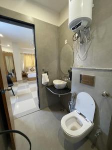 Koupelna v ubytování Hotel Srijan
