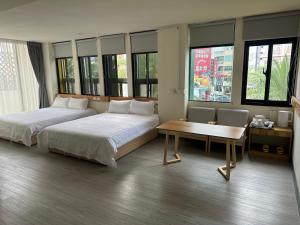 Postel nebo postele na pokoji v ubytování 慢且洄瀾文旅 Bantshiann Hualie Hotel