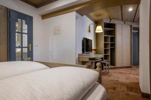 Postel nebo postele na pokoji v ubytování Hotel Promenade + 32 fotografií