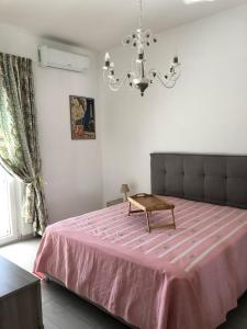 Ένα ή περισσότερα κρεβάτια σε δωμάτιο στο Residence regina Elena U3