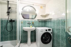 Kúpeľňa v ubytovaní Victus Apartamenty, Apartament Fala Bałtyku