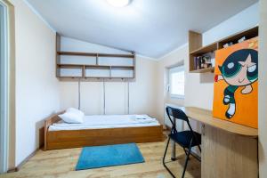Posteľ alebo postele v izbe v ubytovaní Victus Apartamenty, Apartament Fala Bałtyku