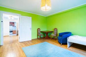 Posteľ alebo postele v izbe v ubytovaní Victus Apartamenty, Apartament Fala Bałtyku + 6 fotografií