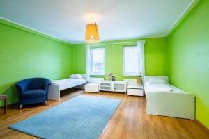 Posteľ alebo postele v izbe v ubytovaní Victus Apartamenty, Apartament Fala Bałtyku