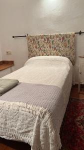 Postel nebo postele na pokoji v ubytování Sa Tafona Esporles "Finca Son Quint"