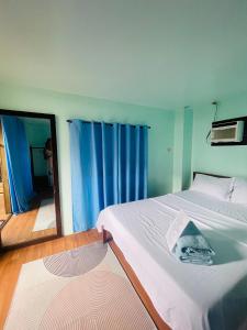 Postel nebo postele na pokoji v ubytování Islahazul Hostel