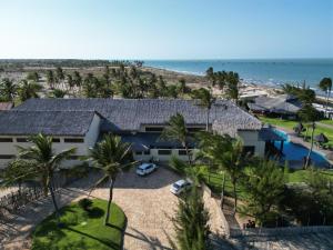 an aerial view of a house on the beach at Hotel Casa do Mar in Icapuí