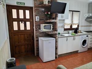 A kitchen or kitchenette at V.V Casa Mones
