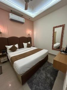 Divine Hotel客房内的一张或多张床位