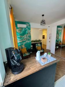 a view of a living room with a kitchen and a table at Roma Imperial Suites in Rome
