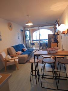 Χώρος καθιστικού στο Beach apartment