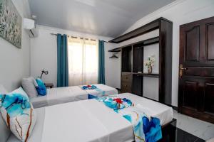 Postel nebo postele na pokoji v ubytování L'échappée du Cap - Spacious Self Catering Apartment + 45 fotografií