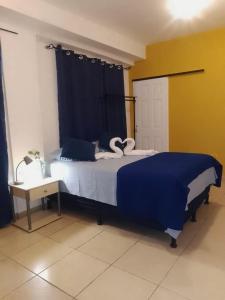 Postel nebo postele na pokoji v ubytování Casa Esmeralda