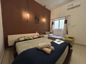 Vuode tai vuoteita majoituspaikassa 4 Person Sliema Spacious Room Airconditioned and Self Check