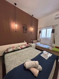 Vuode tai vuoteita majoituspaikassa 4 Person Sliema Spacious Room Airconditioned and Self Check