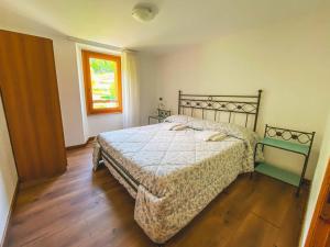 Postel nebo postele na pokoji v ubytování B&B Il Paradiso Mozzio