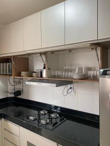 Køkken eller tekøkken på Apto 2 ao lado da UFOP e garagem