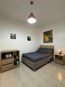 Krevet ili kreveti u jedinici u objektu Hostelfc Javeriana
