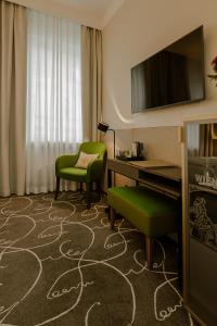 TV a/nebo společenská místnost v ubytování Hotel Erzherzog Rainer