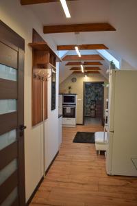 Kuchyň nebo kuchyňský kout v ubytování Apartmány pod Prašivou