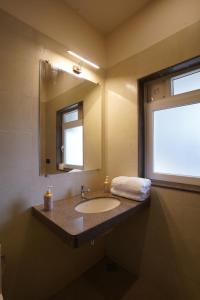 Koupelna v ubytování Hotel Lotus
