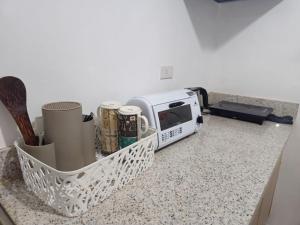 Kuchyň nebo kuchyňský kout v ubytování V- Studio Unit + 10 fotografií