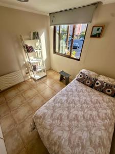 Postel nebo postele na pokoji v ubytování Apartamento en Concón con vista al mar y piscina