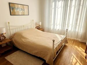 Posteľ alebo postele v izbe v ubytovaní One Bedroom apartment in Cannes Center a few steps from the Croisette and the Martinez Hotel - 2032