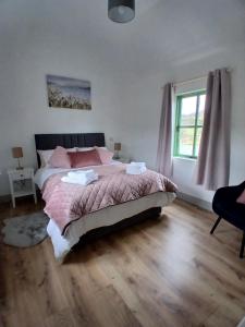 Letto o letti in una camera di St Kevins Cottage