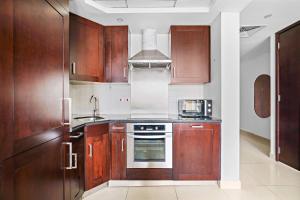 Η κουζίνα ή μικρή κουζίνα στο Silkhaus cozy central studio in Downtown in 29 Boulevard