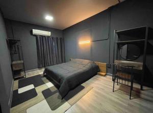 Postel nebo postele na pokoji v ubytování CHUN Hostel