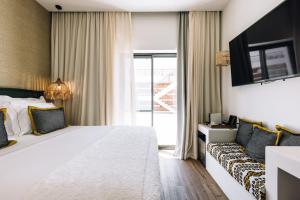 Кровать или кровати в номере AlmaLusa Comporta
