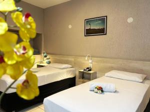 Postel nebo postele na pokoji v ubytování Hotel Econotel by Bsb Inn