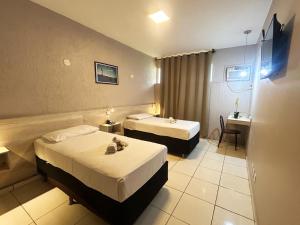 Postel nebo postele na pokoji v ubytování Hotel Econotel by Bsb Inn